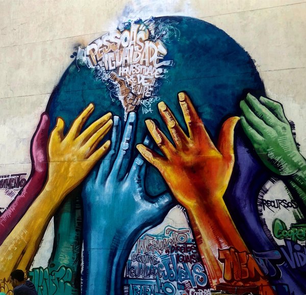 Hands on a globe_Photo_Heaven Crawley_MIDEQ (1).jpg