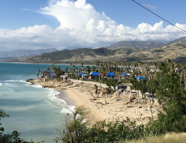 Tarp covered homes in Haiti damaged by Hurricane Matthew in 2016. Photo INURED 2016. Used with permission