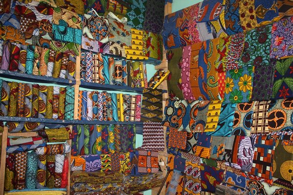 Waxprints_in_a_West_African_Shop_Photo_Alexander_Sarlay_CCBYSA.jpg